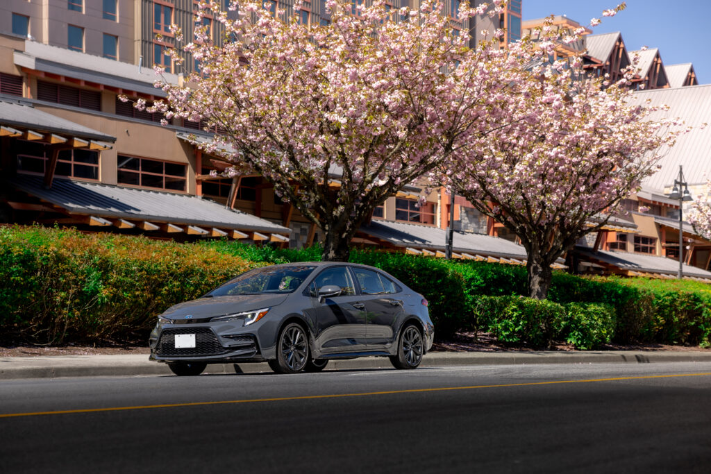 2026 Toyota Corolla showcasing a modern compact sedan design with a sleek exterior, efficient aerodynamic styling, LED headlights, sporty front grille, and Toyota’s signature reliability-focused design.