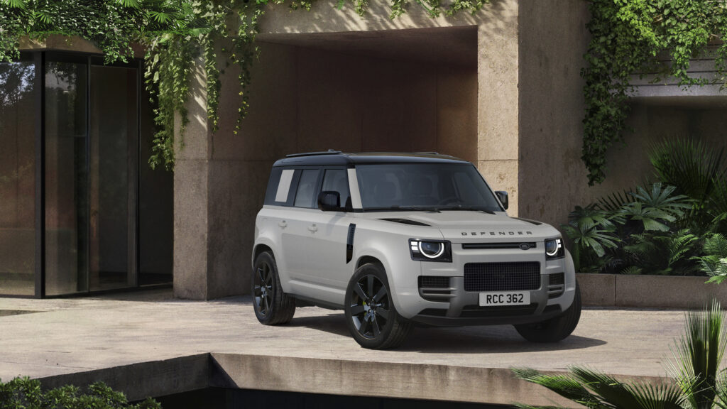 2026 Land Rover Defender SUV in front three-quarter view with rugged design and LED headlights.
