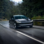 2026 Tesla 3 front view with sleek minimalist electric sedan design