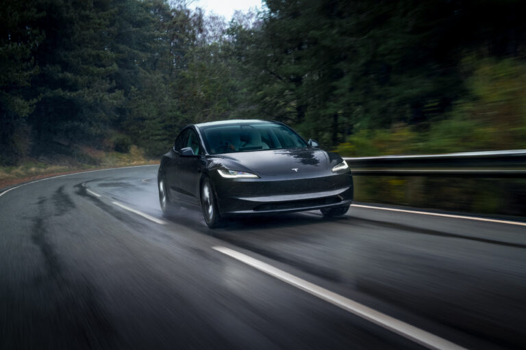 2026 Tesla 3 front view with sleek minimalist electric sedan design