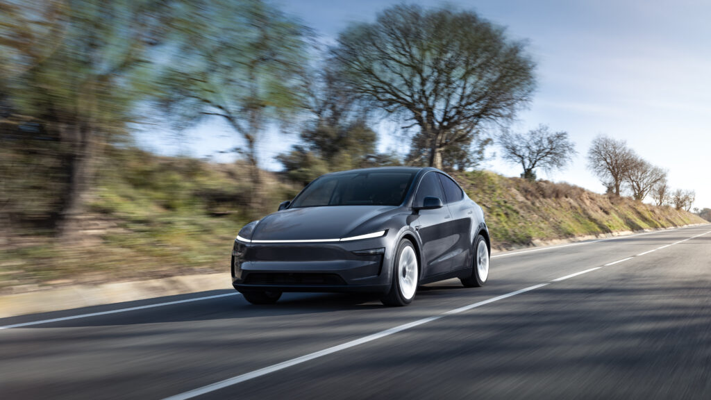 2026 Tesla Model Y featuring a modern all-electric SUV design with aerodynamic styling, sleek LED lighting, spacious proportions, minimalist exterior details, and Tesla’s signature futuristic appearance.