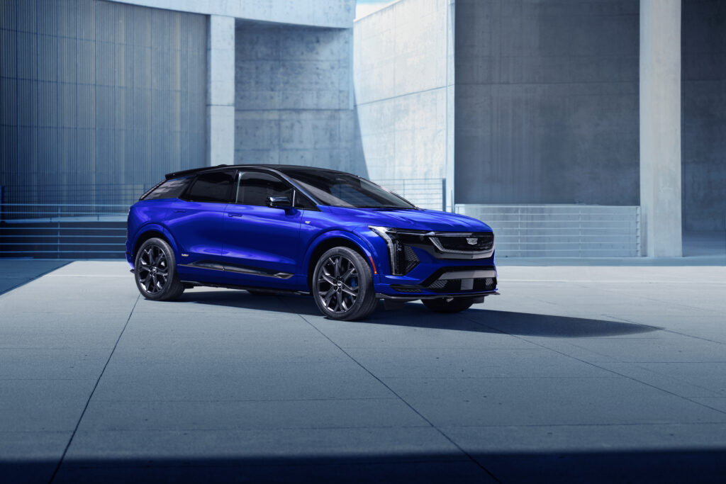2026 Cadillac Optiq featuring a premium electric compact SUV design with a bold front fascia, signature LED lighting, aerodynamic body lines, luxury details, and a modern Cadillac-inspired exterior.