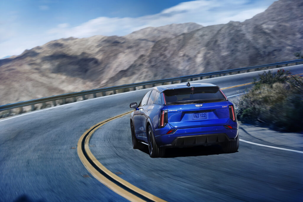 rear view of the 2026 cadillac optiq v in deep ocean tintcoat