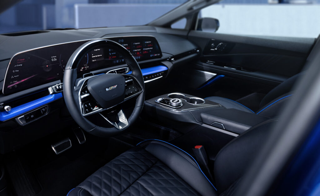 the 2026 cadillac optiq v in noir with santorini blue accents interior palette
