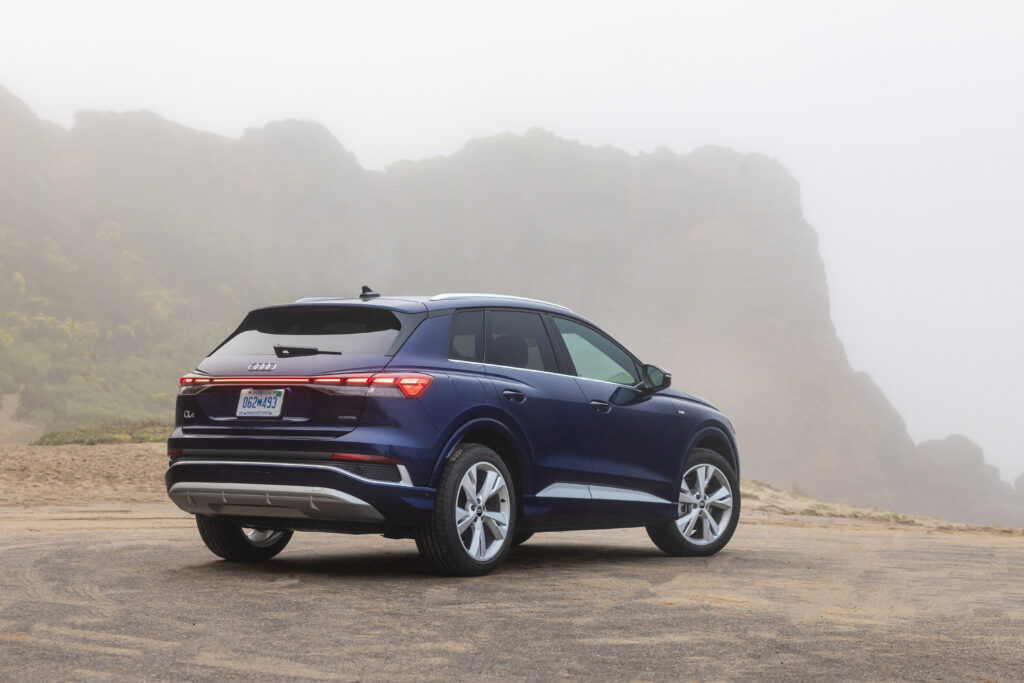 2027 audi q4 quattro e tron premium electric suv showcasing sleek design, quattro all wheel drive, and advanced ev technology back side design