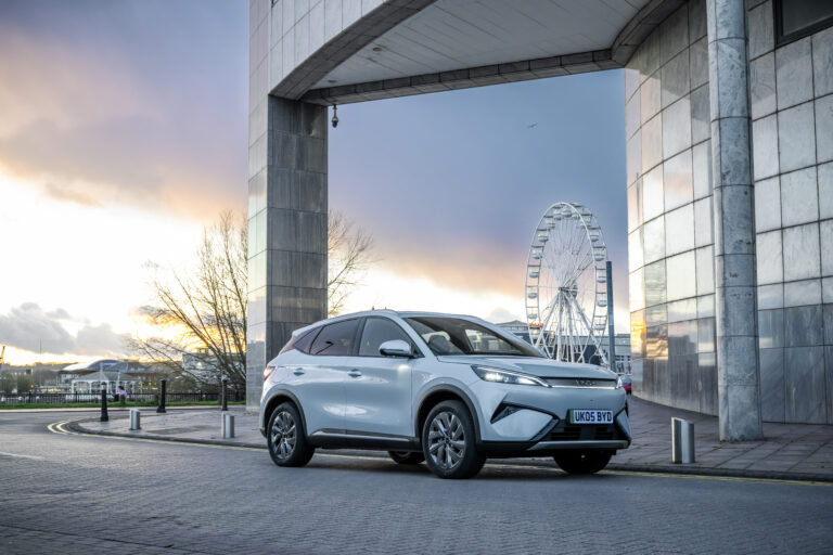 2027 BYD Atto 3 electric SUV with modern design, LED lights and stylish exterior shown on the open road.